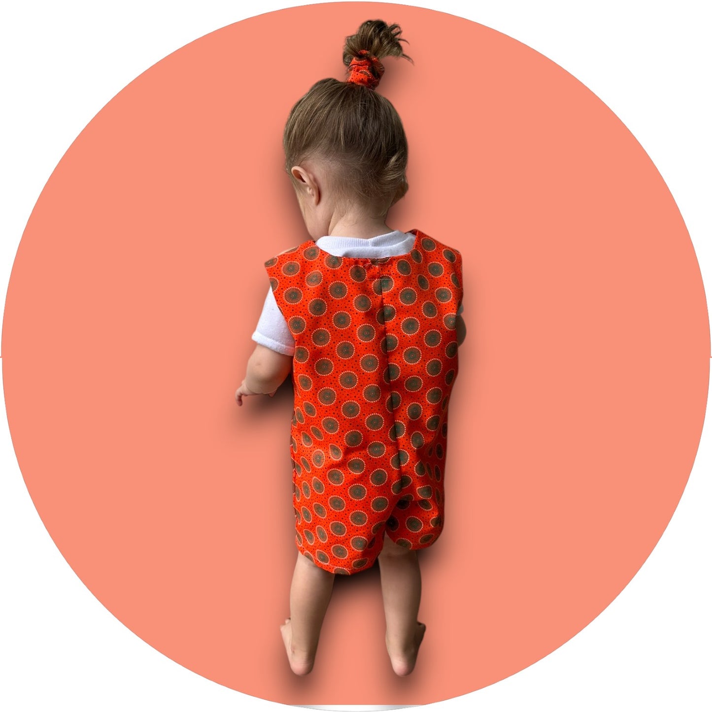 Baby orange shweshwe jumper with pocket