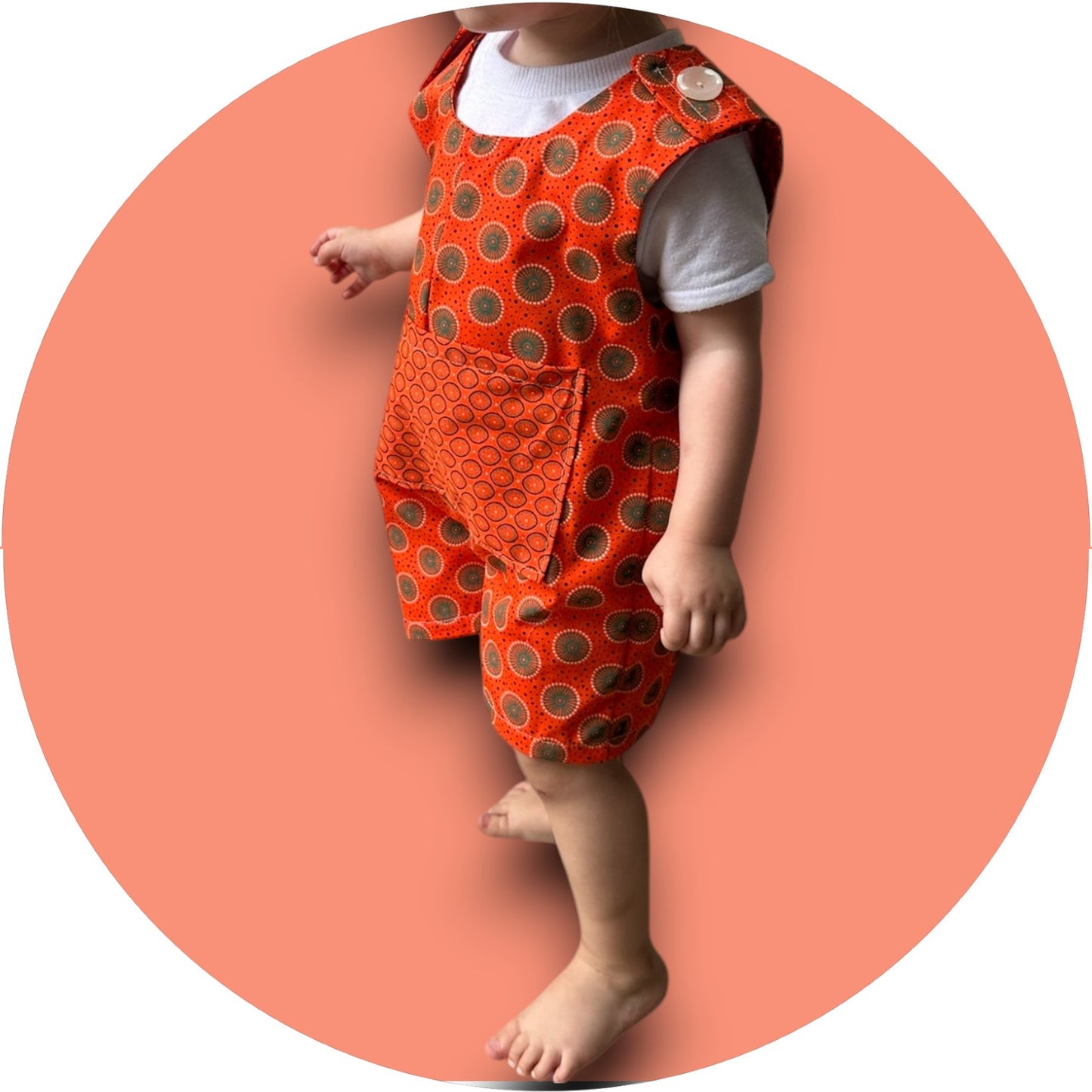 Baby orange shweshwe jumper with pocket