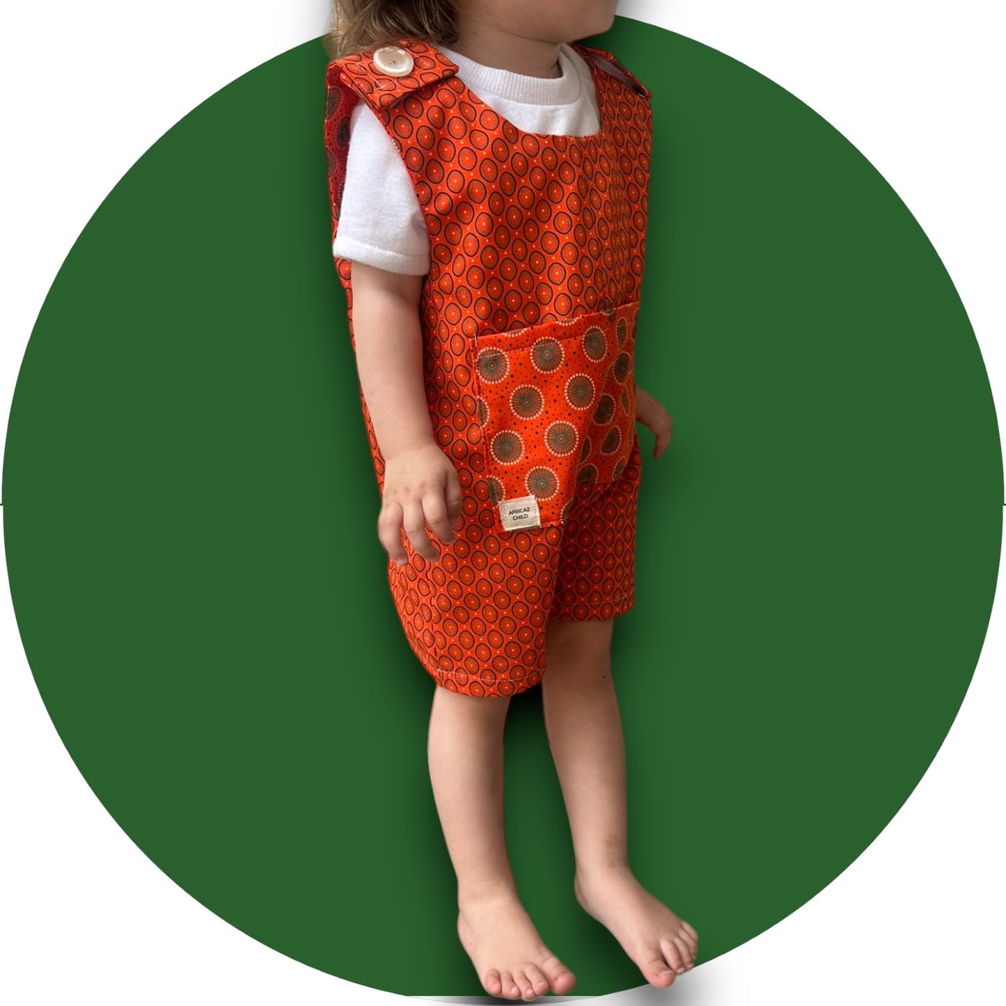 Baby orange shweshwe jumper with pocket