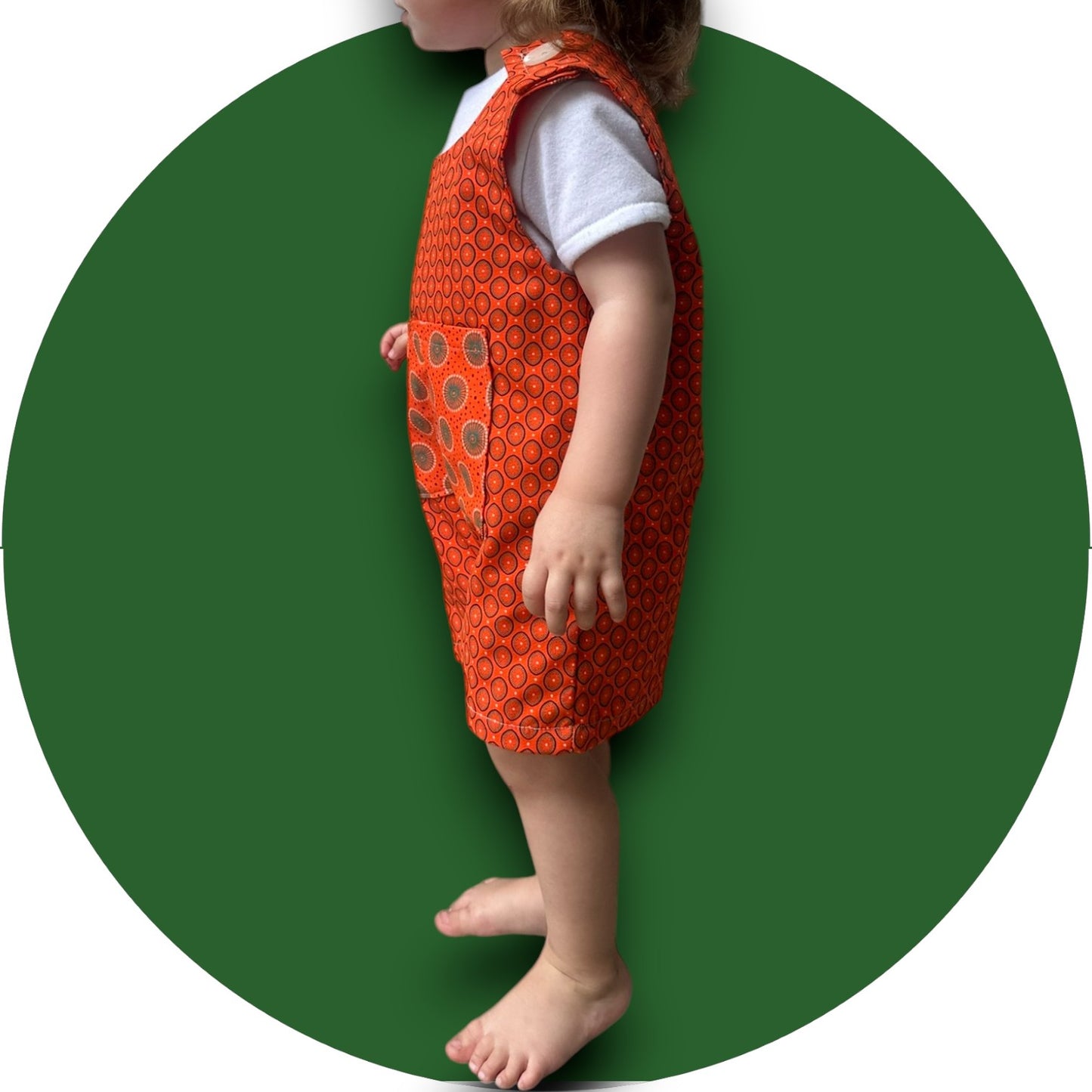 Baby orange shweshwe jumper with pocket