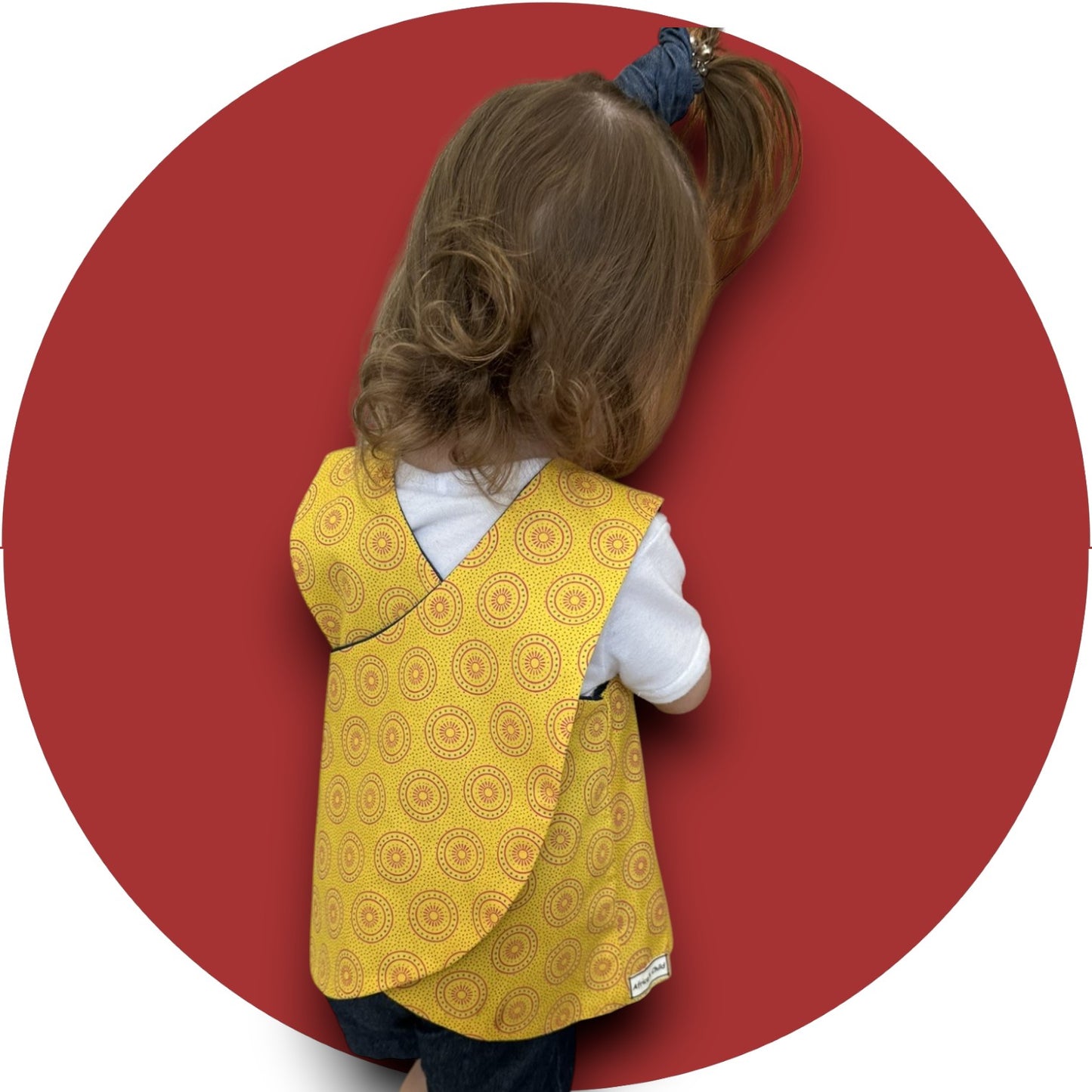 Baby mustard shweshwe cross-over top
