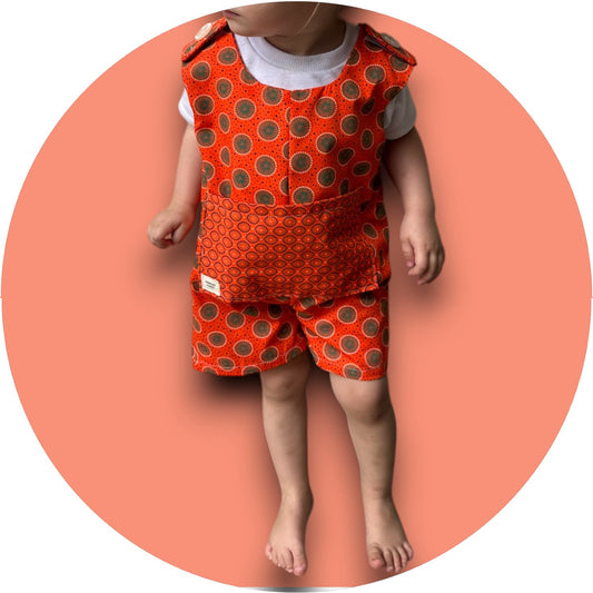 Baby orange shweshwe jumper with pocket